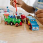 Melissa & Doug Decorate-Your-Own Wooden Craft Kits Set - Plane, Train, and Race Car - Image 6